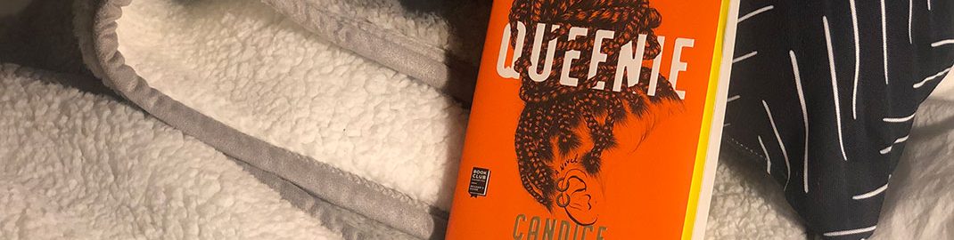 Queenie book on a blanket