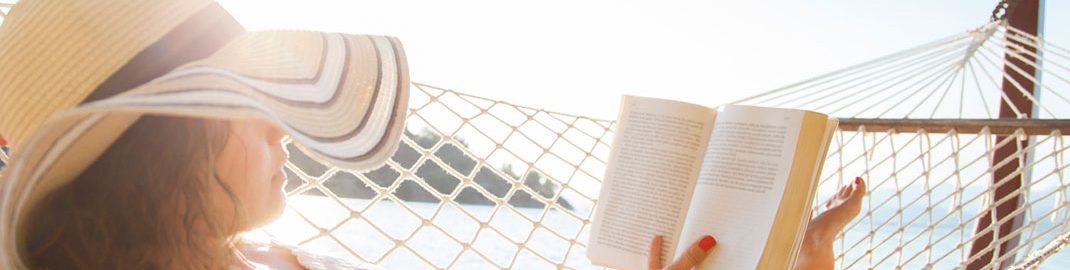 Woman reading on a hammock